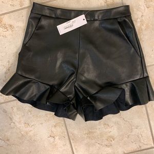 Size small Beau Tissu faux leather shorts